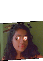 a girl with hearts around her head looks at the camera with her eyes wide open