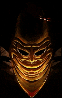 a painting of a clown 's face with a huge smile