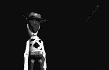 a black and white photo of woody saying `` you '' .