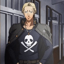a man wearing a black shirt with a skull on it