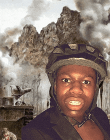 a man wearing a helmet is standing in front of a mountain