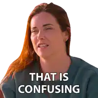 a woman with red hair has a sticker on her face that reads that is confusing