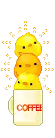 three chicks are stacked on top of a cup of coffee