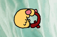 a cartoon drawing of a yellow object with a red swirl around it