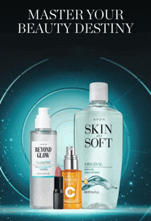 a bottle of avon skin so soft sits next to a bottle of avon beyond glow