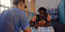 Playing Checkers Arcade Fire GIF - Playing Checkers Arcade Fire Peter Pan GIFs