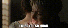 a man and woman are hugging each other and the woman is saying `` i miss you so much . ''