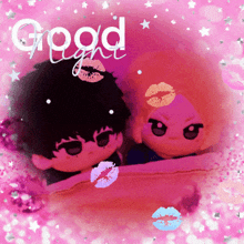 a couple of stuffed animals laying in bed with the words good night written above them