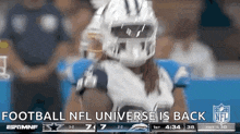 a football player is wearing a helmet with the words football nfl universe is back