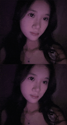 a woman is taking a selfie in the dark