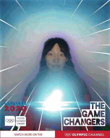 a poster for the youth olympic games shows a woman holding a light