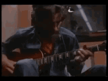George Harrison It Dont Come Easy GIF - George Harrison It Dont Come Easy Playing Guitar GIFs