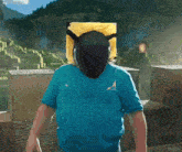 a man wearing a blue shirt has a picture of a bee on his head and says i am bee