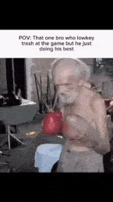 an elderly man wearing boxing gloves is doing his best
