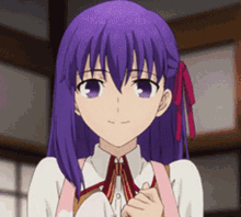 a close up of a girl with purple hair and a pink shirt