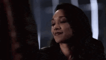 a woman is smiling and saying `` i 'm serious '' while looking up .