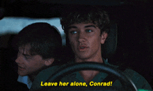 three people in a car with the words leave her alone conrad on the bottom right