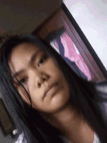 a close up of a person 's face with their eyes closed