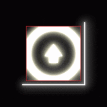 a white circle with an arrow pointing up