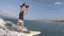 Surfboard Stunt GIF - Surfboard Stunt Holding Kid GIFs