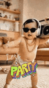 a baby wearing headphones and sunglasses is holding a boombox in his hand .