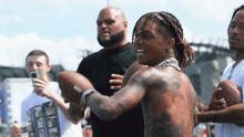 Throwing A Football Swae Lee GIF - Throwing A Football Swae Lee Passing The Football GIFs