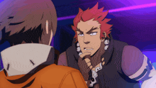 a man with red hair is talking to another man in an orange jacket