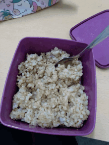 a bowl of food with a spoon in it