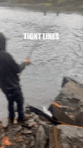 a blurry picture of a person fishing with the words tight lines below them