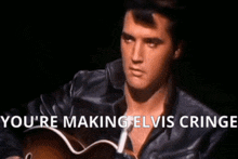 elvis presley is holding a guitar and says you 're making elvis cringe .