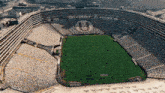 an aerial view of a soccer stadium with the letter u on the top of it