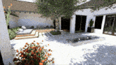 a rendering of a courtyard with a tree and a fountain