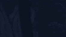 a dark blue background with a drawing of a face