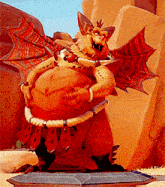 a statue of a fat dragon with wings and a crown on its head