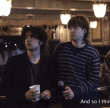 two men standing next to each other with the words " and so i thin " on the bottom right