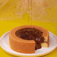 a cake with a slice taken out of it on a plate