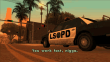 a lsopd police car is parked on the side of the road