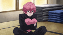 a cartoon character with pink hair is sitting on the floor