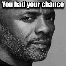 a black and white photo of a man with a beard and the words you had your chance above him