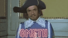 a man in a costume with the word gmetha written in neon