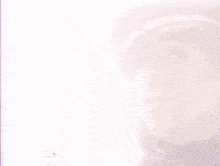 a close up of a person wearing a hat with a purple background