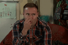 Tyrone Pretending To Stretch His Nose Coronation Street GIF - Tyrone Pretending To Stretch His Nose Coronation Street Corrie GIFs