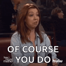 a woman from how i met your mother is sitting at a table and making a face .