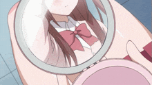 a girl in a pink bow tie is looking at her reflection in a mirror