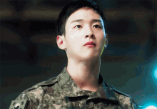 a close up of a man in a military uniform with a patch that says ' korean flag ' on it