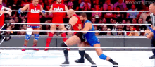 Bobby Roode Spinebuster GIF - Bobby Roode Spinebuster Triple H GIFs