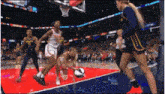 a basketball game is being played with a cheerleader in a blue uniform