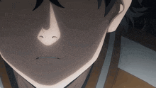 a close up of a person 's face with a shadow on it