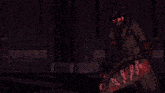 a pixel art of a person holding a sword with the letter f visible