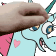 a person 's hand is sticking out of a unicorn 's nose .